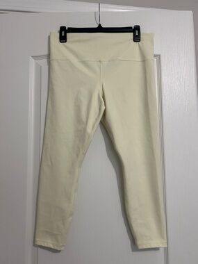 Athleta Ultra High Rise Elation 7/8 Tight- Pale Yellow leggings. Size L